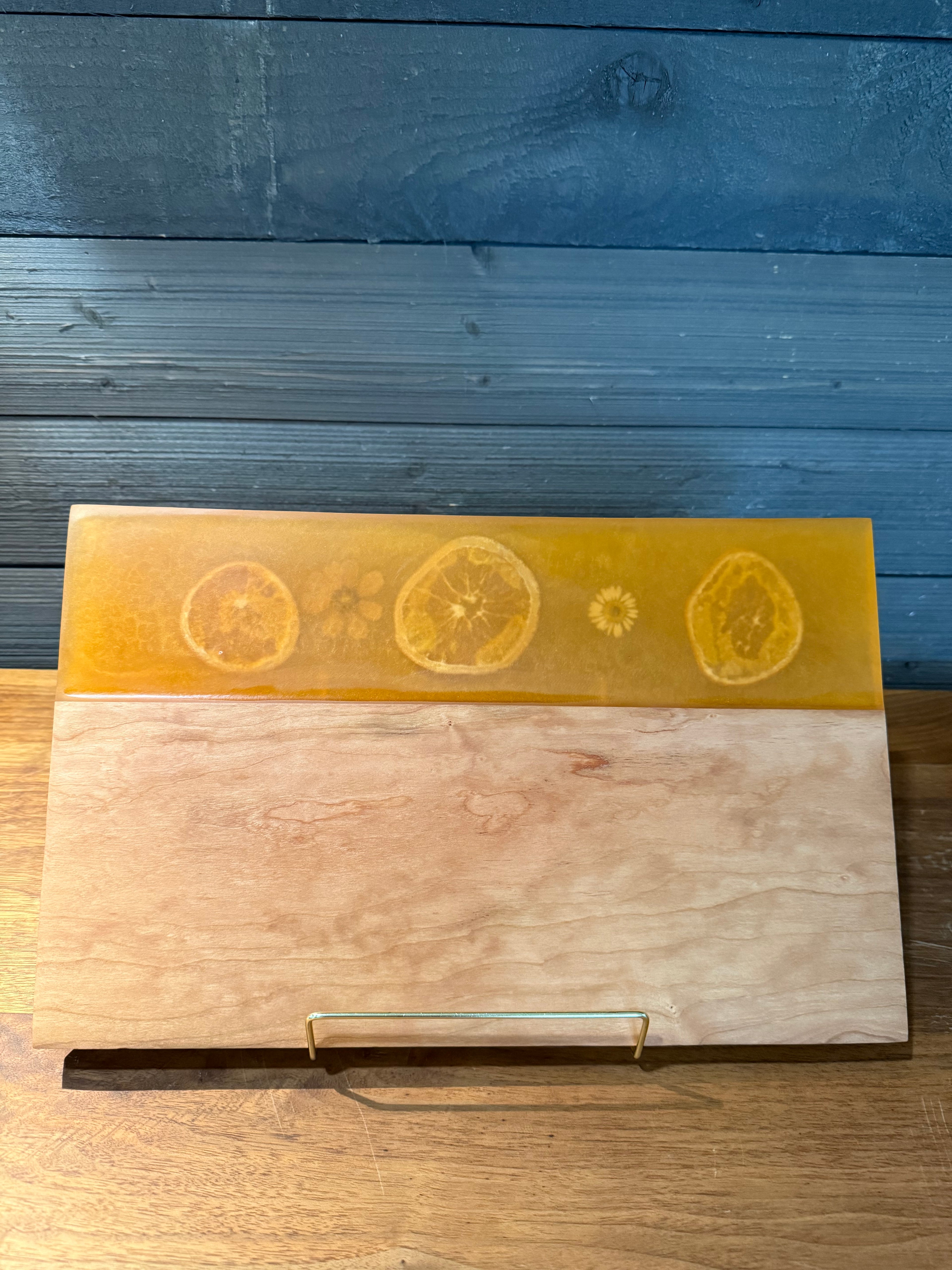 Oranges Embedded on Cherry Wood