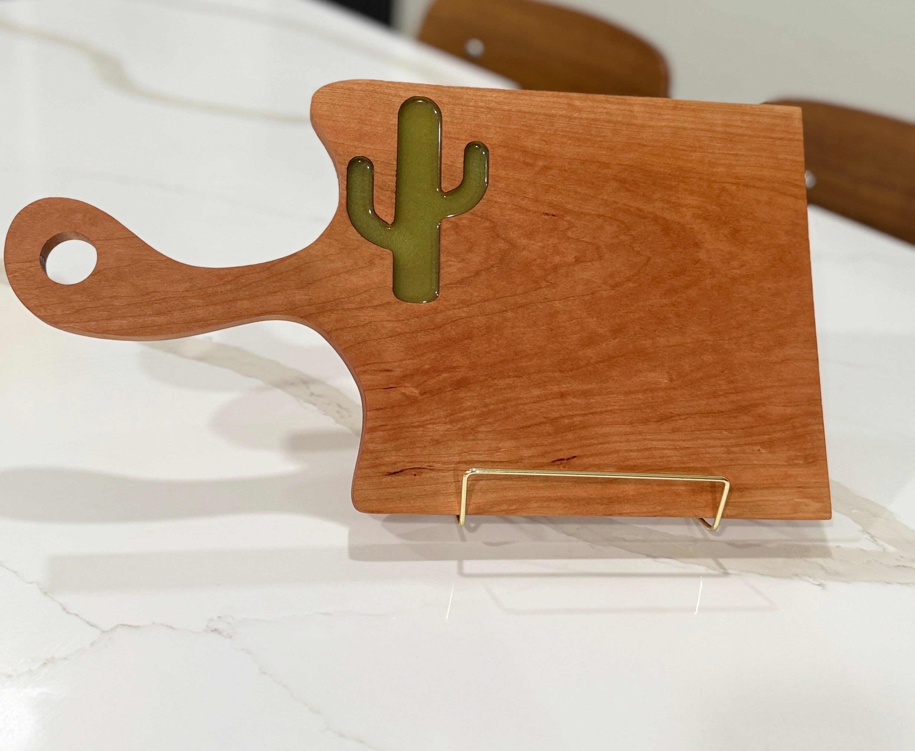 Green Cactus on Cherry Wood