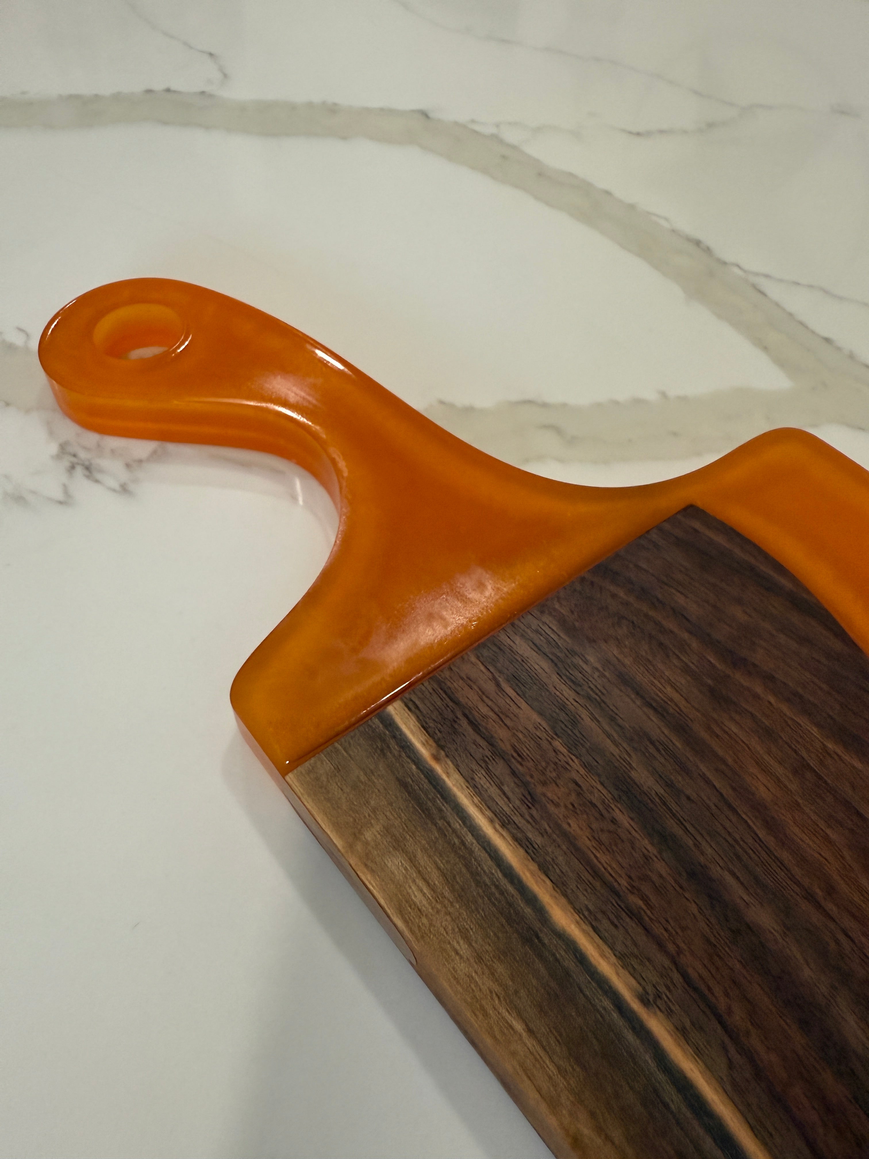 Orange Epoxy and Walnut Cutting Board