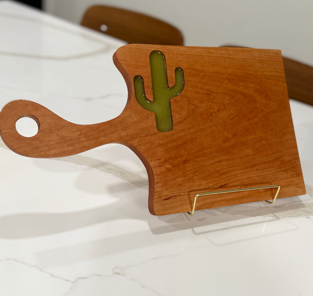 Green Cactus on Cherry Wood