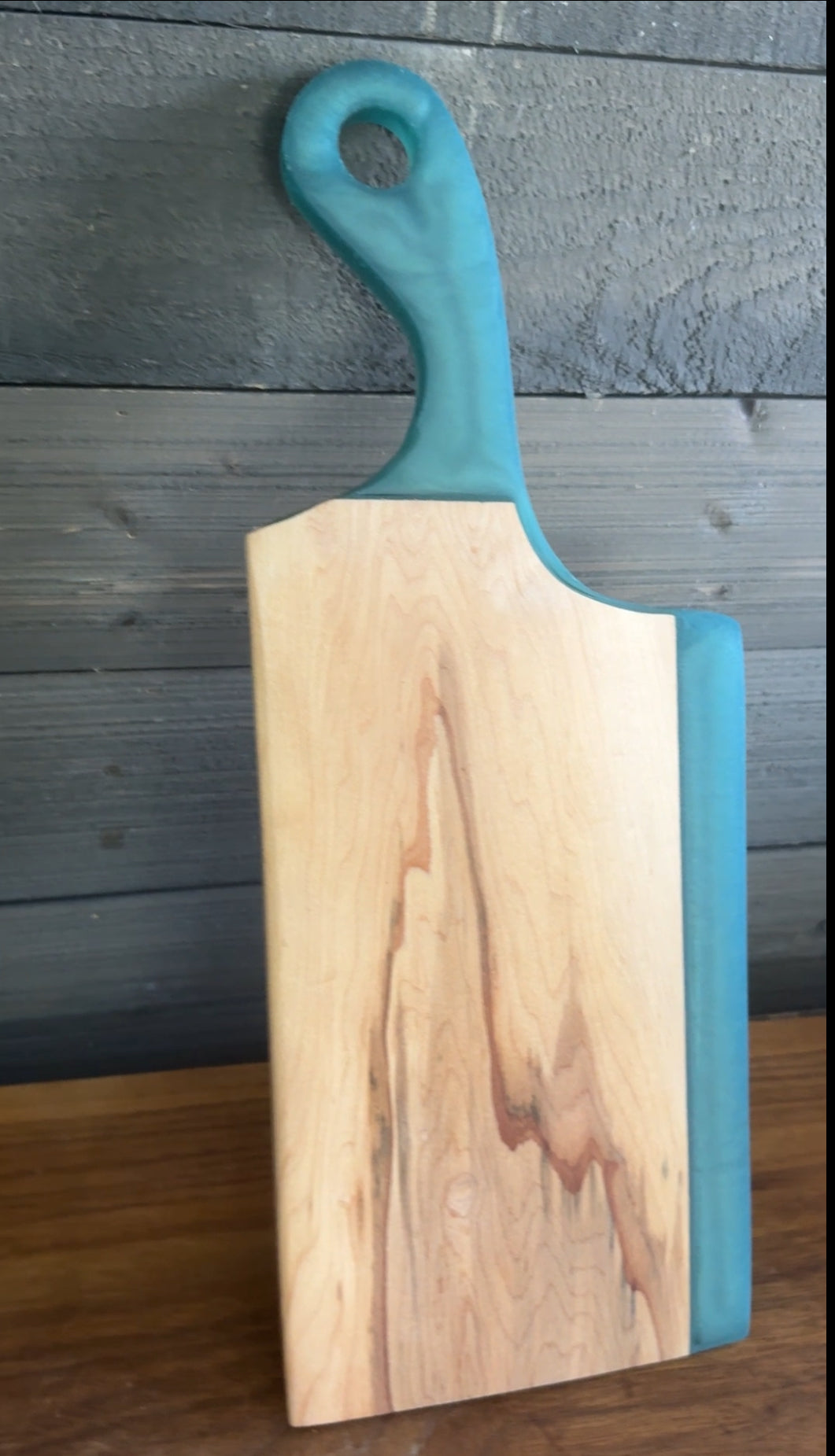 Teal Epoxy Handled Cutting Board with a Maple Cutting Surface.