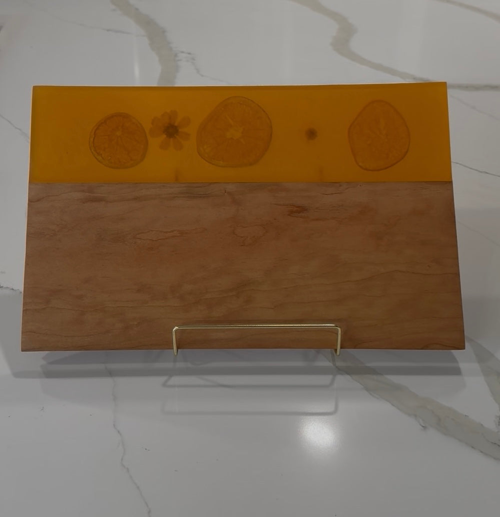 Oranges Embedded on Cherry Wood