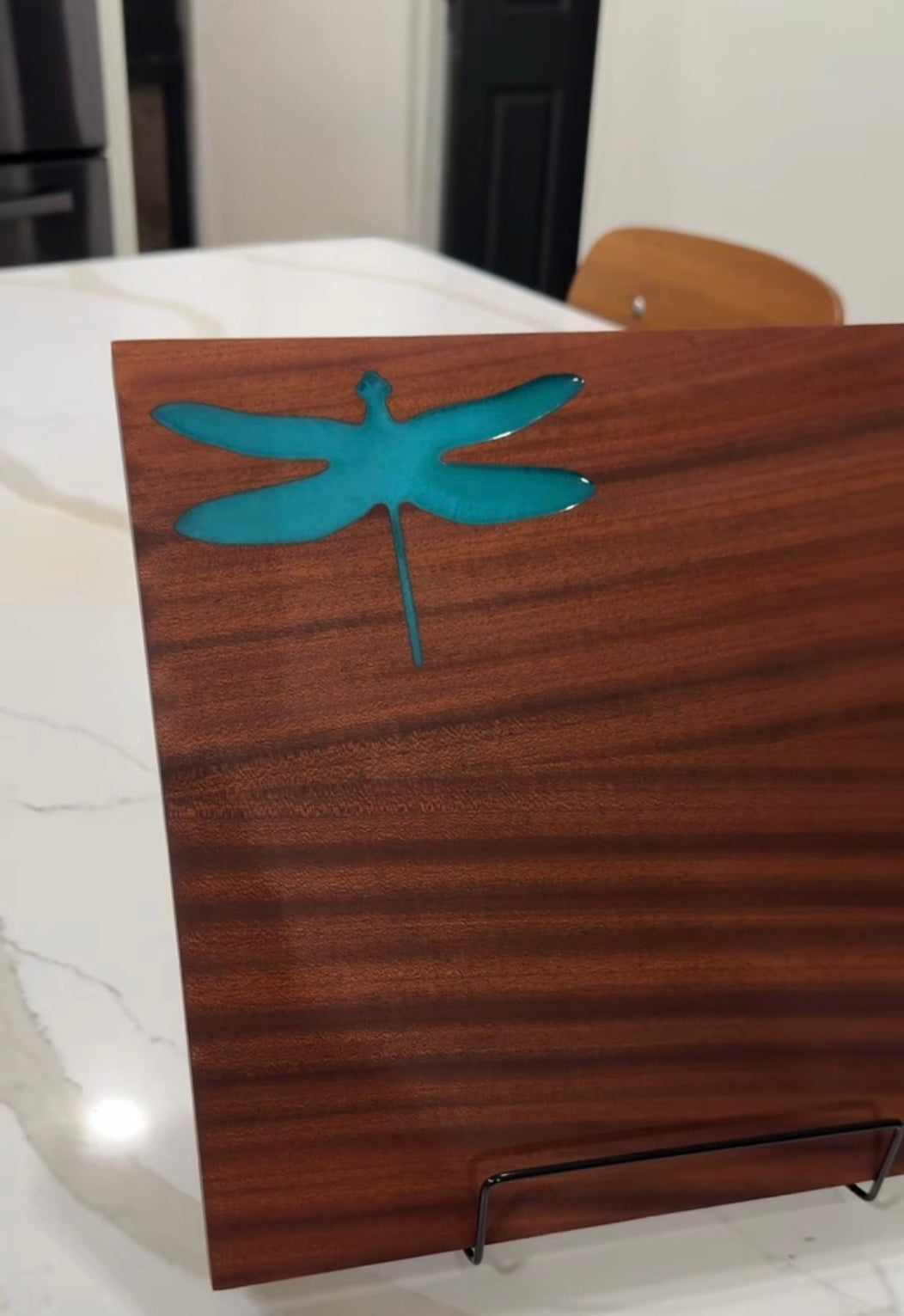 Dragonfly on Mahogany