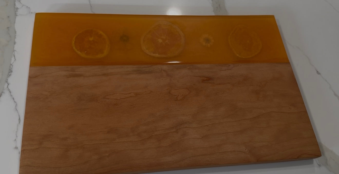 Oranges Embedded on Cherry Wood