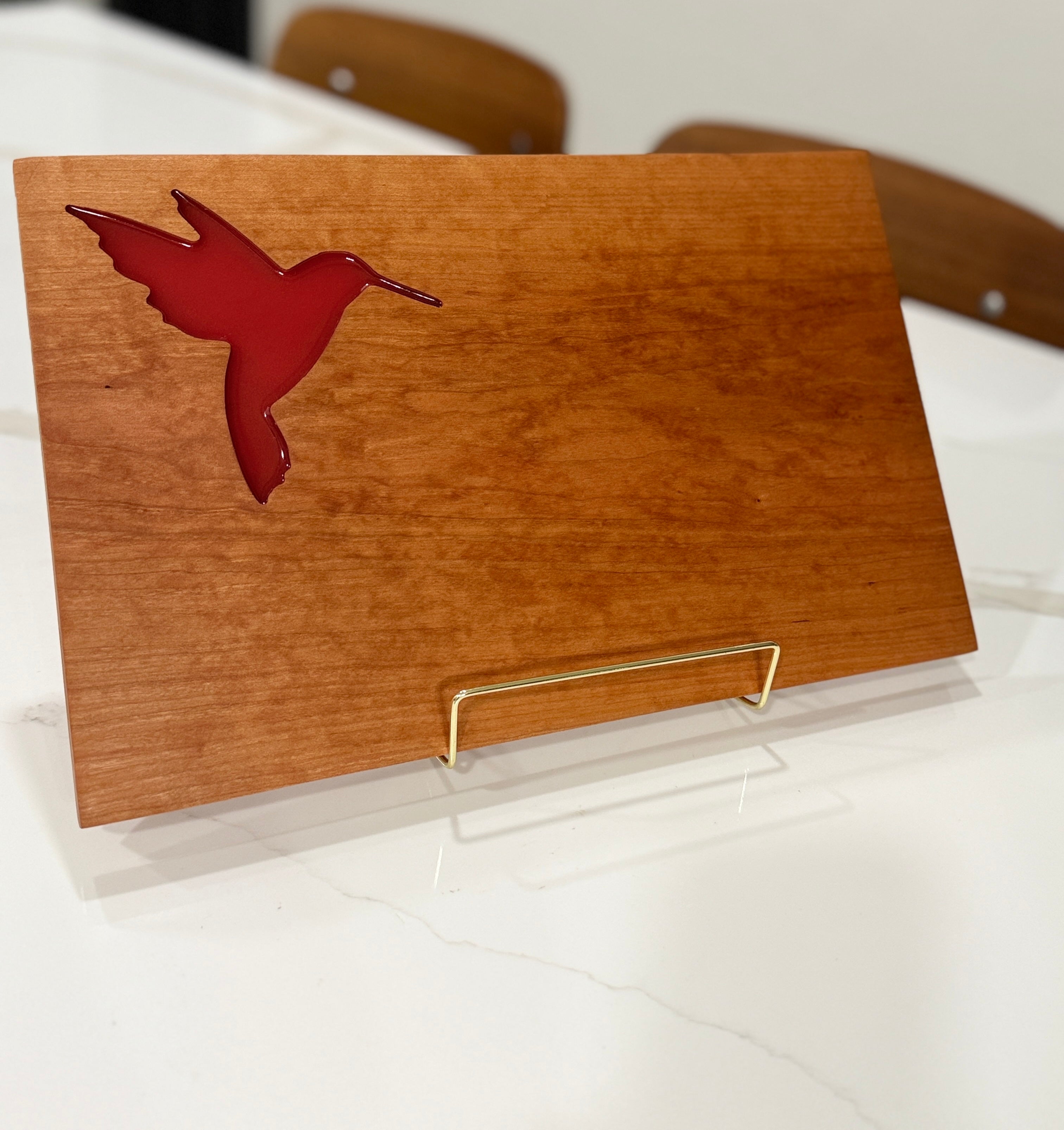 Red Hummingbird on Cherry Wood
