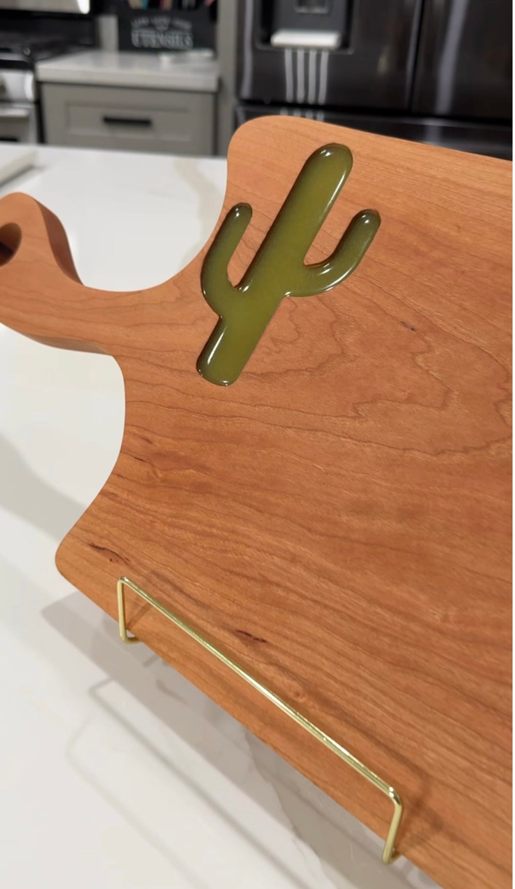 Green Cactus on Cherry Wood