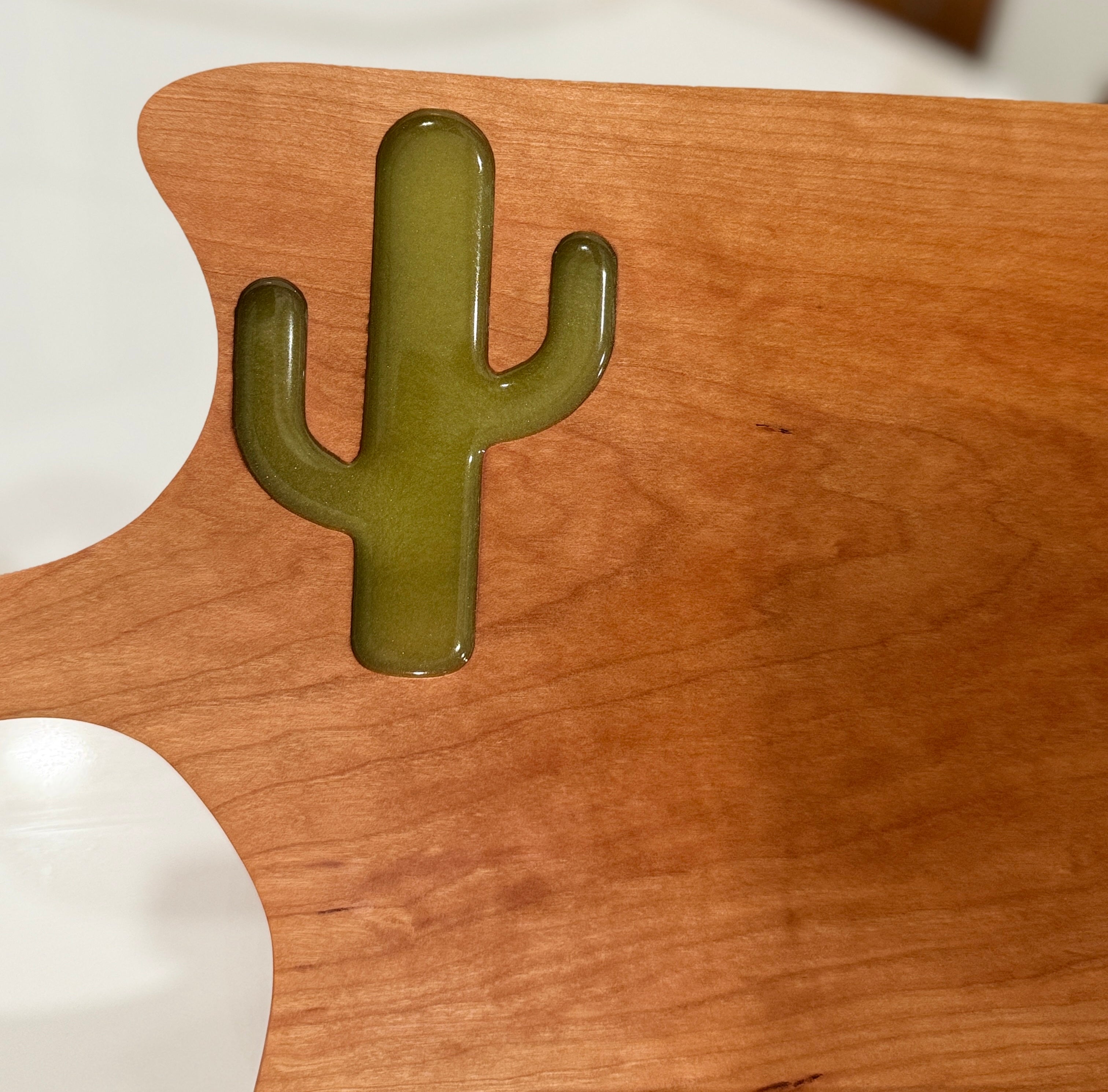 Green Cactus on Cherry Wood